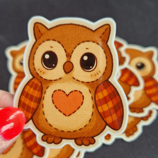 Gullig uggle-sticker.